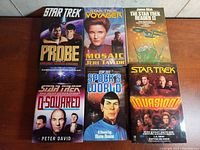 Front covers of six Star Trek books with characters from The Next Generation and Voyager series, showing colors and titles clearly.