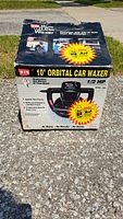 Front box of WEN 10" orbital car waxer showing product image and branding.