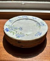 Stack of 6 vintage Hammersley fine bone china dinner plates with floral pattern and gold rim.