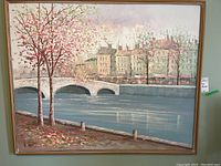 Front view of the framed painting showing the full artwork and frame