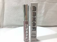 Front view of Buxom Full-On Lip Cream lip gloss and its packaging box showing product name and branding