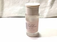 Front view of the full bottle showing product name and volume 120 ml.