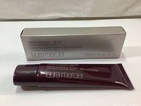 Laura Mercier tinted moisturizer 50ml tube with box, showing front and top with product details and branding.