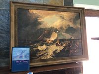 Front view of framed painting with included Turner book at base