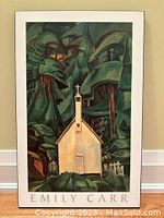 Full view of the plak showing the white church with forest background and the name EMILY CARR at the bottom.