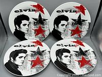 Set of 4 ceramic dinner plates displaying young Elvis Presley in black and white with red and black stars, arranged in the photo to show the full set.