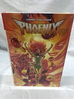 Front cover of Phoenix Omnibus Vol. 1 hardcover comic book with vibrant orange and yellow Phoenix character illustration.
