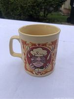 Front side of the mug showing Swedish Chef with spoon and fork design