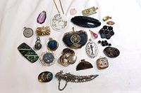 Overhead view of all 21 pieces laid out on white cloth