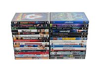 Two stacks of DVD cases showing 30 movies with titles visible on spines.