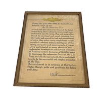 Framed letter from US Navy Submarine Atlantic Fleet recognizing service from 1941-1945 with decorative gold submarine at the top.
