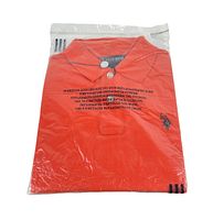 Photo showing the front of the orange US Polo Association polo shirt folded inside a clear plastic sealed bag, highlighting the button collar and embroidered logo.