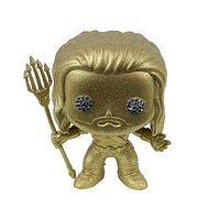 Front view of gold Aquaman Funko Pop figure holding a trident, showing detailed hair and textured eyes.
