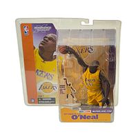 Front view of Shaquille O’Neal McFarlane NBA Series 2 action figure in original sealed blister packaging with Lakers graphics.