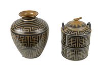 Vintage lidded canister in black and gold with Greek key pattern, two-tiered with handles and lid