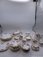 Full overview of all plates, bowls, cups, teapot, sugar bowl, creamer, gravy boat and platter