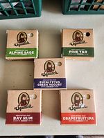 Five bars of Dr. Squatch men's natural soap showing all five varieties.