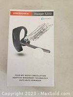 Box of Plantronics Voyager 5200 wireless Bluetooth headset with noise cancellation