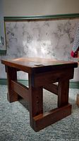 Wood farmhouse style end table showing thick base and worn wood top with natural grain, dimensions 16x24x17 inches.