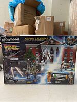 Playmobil Back to the Future Advent Calendar box showing the front fully including Twin Pines Mall scene and details on the set including set number 70574 and age range 5-99.