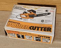 Original Remington Powercutter electric chainsaw box featuring product illustration and branding