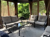 Full set under gazebo: loveseat, two chairs, coffee table