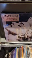 Close-up of Madonna vinyl record in front of the collection