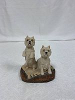 Front view of the Westies sculpture showing the two dogs on a base.