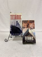 Front cover images of two Titanic VHS tapes, one with a black and white ship image and the other featuring actors and ship at an angle