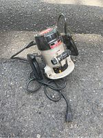Full view photo of the Craftsman electric router with cord and plug visible, showing model 315.17381