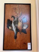 Framed wood panel depicting a wood duck