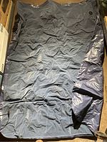 Full blue Eddie Bauer air mattress unfolded, showing size and texture.