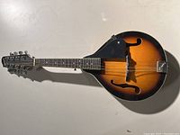 Full top-down view of the Savannah F-style mandolin showing sunburst finish and f-holes.