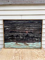 Frontal view of the signed original oil painting with abstract impressionist style, dark swirling brush strokes, and a splash of blue at the bottom, framed in gold.