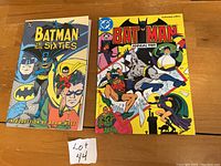 Front view of the two Batman comics together showing covers.