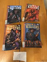 Four comic books titled Saint of Killers from the Preacher series, issues 1 through 4 with illustrated western-themed covers