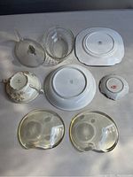 All dishware items shown upside down to display maker marks and details