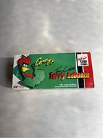Box featuring Corny rooster mascot and Terry Labonte's signature, text indicating 1:24 scale stock car and limited edition status