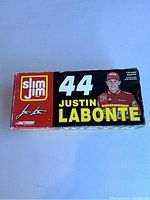 Box cover showing Slim Jim logo, #44, Justin Labonte name and photo, Action branding, and stock car model information.