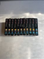 Photo showing 11 Star Trek original series VHS tapes with episode numbers 34-40, 44, 54, 55, and 61 visible on the spine labels.