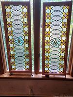 Both panels standing side by side, showing full design and wood frames