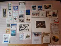 Image showing the spread of over 30 vintage WWII Christmas cards plus art and Asian prints