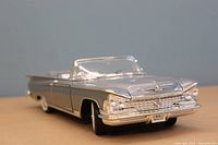 Front angle view of the silver 1959 Buick Electra 225 diecast model showing detailed grille, headlights, and windshield