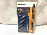 Complete set including calligraphy pen, four 1.2mm nib cartridges, and ink converter in original packaging.