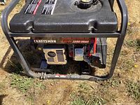 Front view of Craftsman portable generator showing 6.5 HP and 3250 Watt label and metal frame.