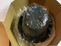 Hat wrapped in plastic inside original Dobbs box.