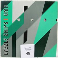 Vinyl LP album cover front with modern geometric abstract design and text 'DAZZLE SHIPS | OMD'