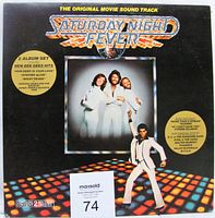 Front cover of the Saturday Night Fever Original Motion Picture Soundtrack double LP set featuring Bee Gees and disco dance floor artwork.