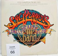 Front view of the gatefold jacket featuring the Sgt. Pepper's Lonely Hearts Club Band logo.