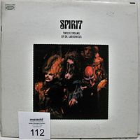 Front cover of the Spirit Twelve Dreams Of Dr. Sardonicus vinyl LP album showing the surreal distorted band photo and white cover with the album title and artist.